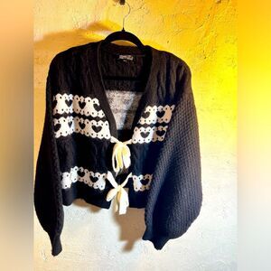 Sweater Nobody’s Child, black w/ hearts and bows to tie front, unique cropped